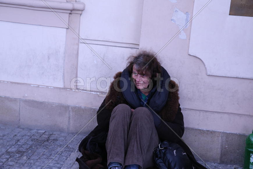 Попрошайка