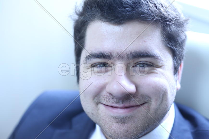 Илья Борисович Флакс улыбается