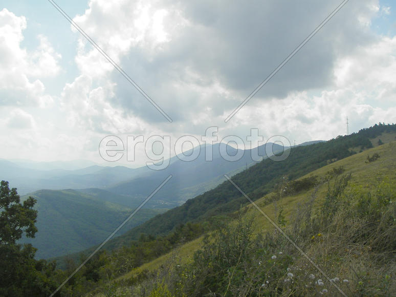 Луч солнца из-за облаков