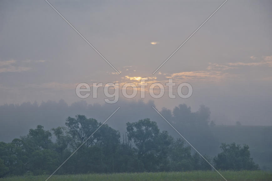 Закат за облаками