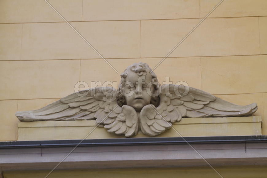 Маскарон-ангел