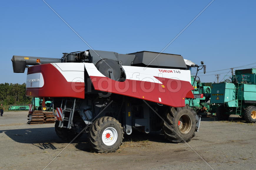 Russia, Poltavskaya village - September 6, 2015: Combine harvesters Torum. Agricultural machinery