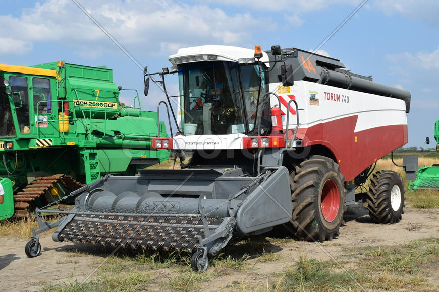 Russia, Poltavskaya village - September 6, 2015: Combine harvesters Torum. Agricultural machinery
