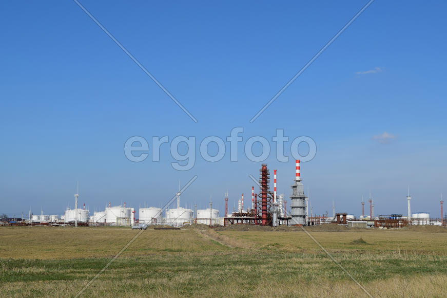 Distillation columns, pipes and other equipment furnaces refinery. The oil refinery. Equipment