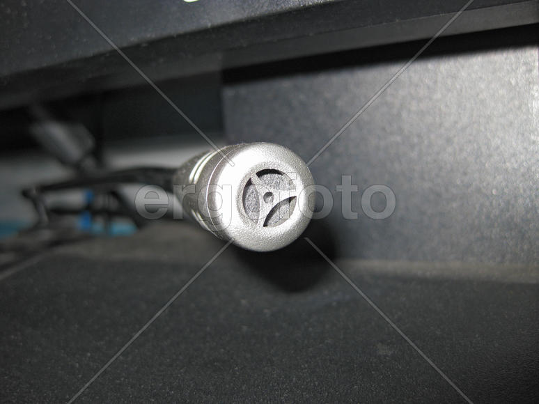 Desktop computer microphone. Means voice communication on the Internet