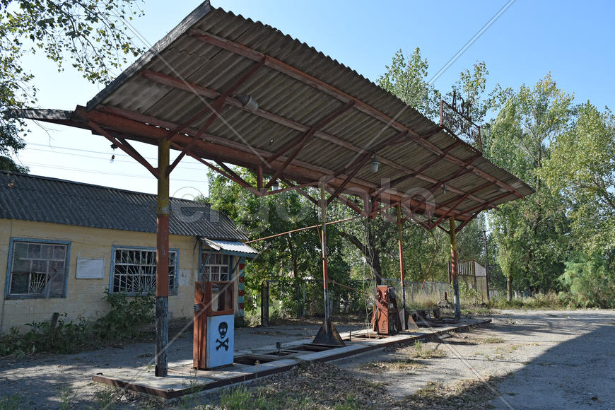 The old thrown gas station. Structure of times of socialism