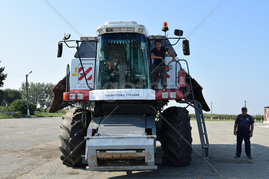Russia, Poltavskaya village - September 6, 2015: Combine harvesters Torum. Agricultural machinery
