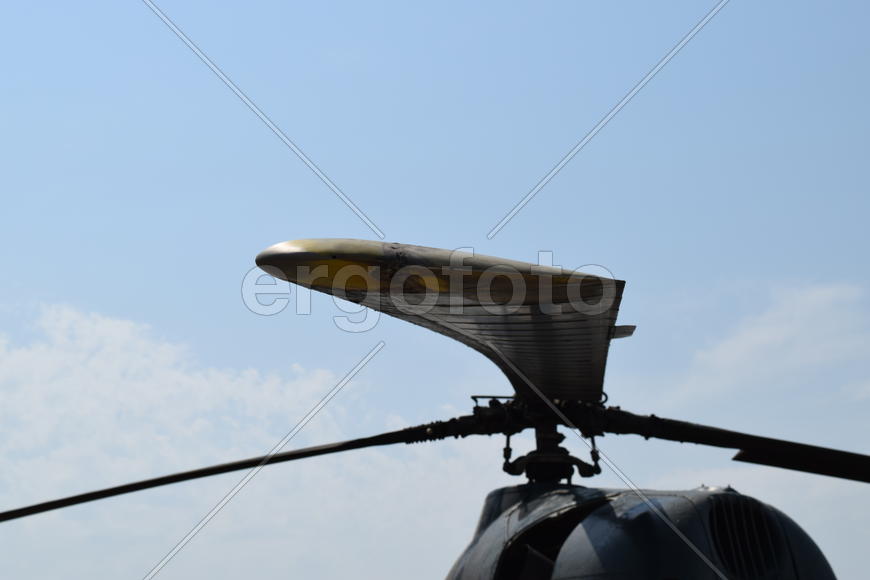 Old helicopter spraying fields. Helicopter spraying fertilizer.