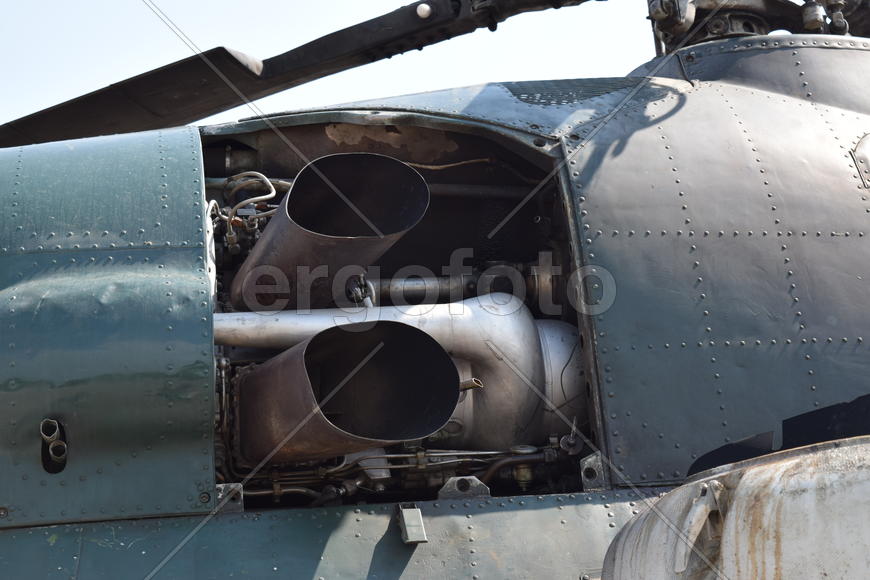 Old helicopter spraying fields. Helicopter spraying fertilizer.