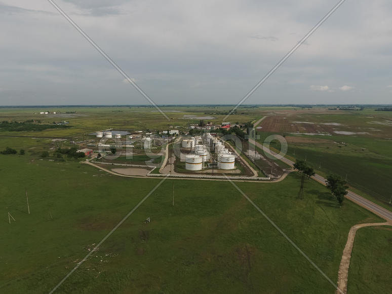 Aerial view of oil storage tanks. Industrial facility for the storage and separation of oil.