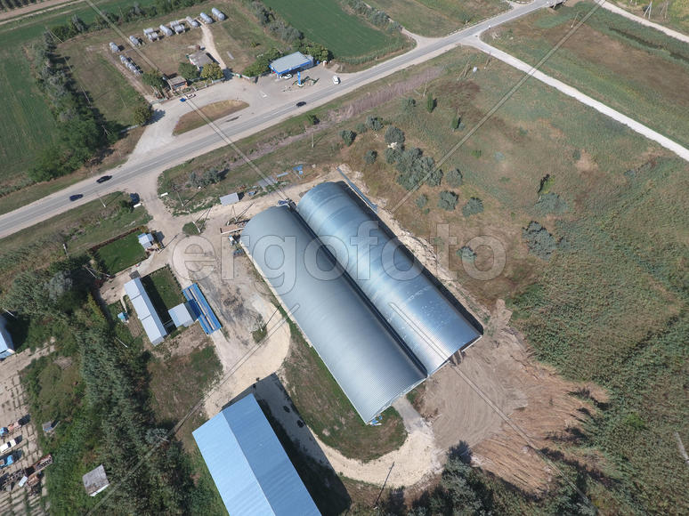 Top view of the hangars. Hangar of galvanized metal sheets for the storage of agricultural products 