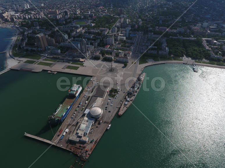 Top view of the marina and quay of Novorossiysk. Urban landscape of the port city.