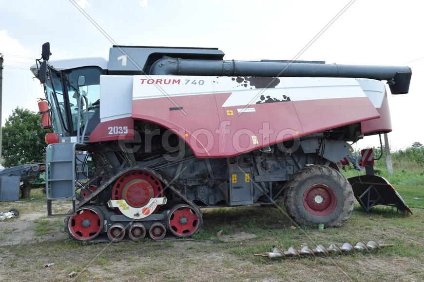 Russia, Poltavskaya village - September 6, 2015: Combine harvesters Torum. Agricultural machinery
