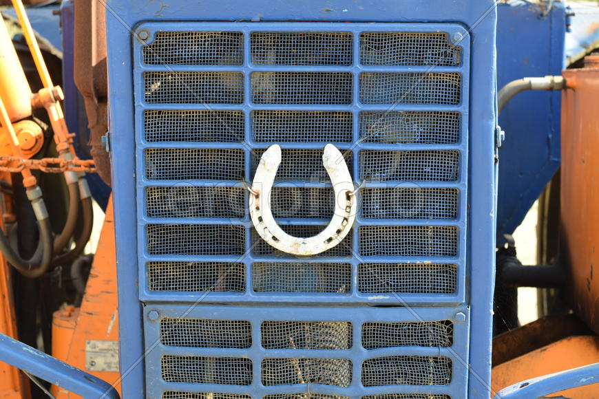 Tractor, standing in a row. Agricultural machinery. Parking of agricultural machinery.