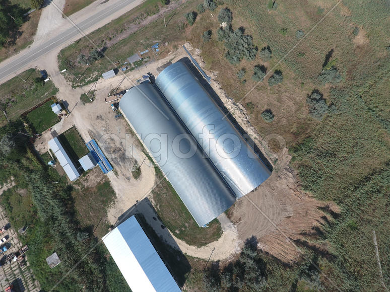 Top view of the hangars. Hangar of galvanized metal sheets for the storage of agricultural products 