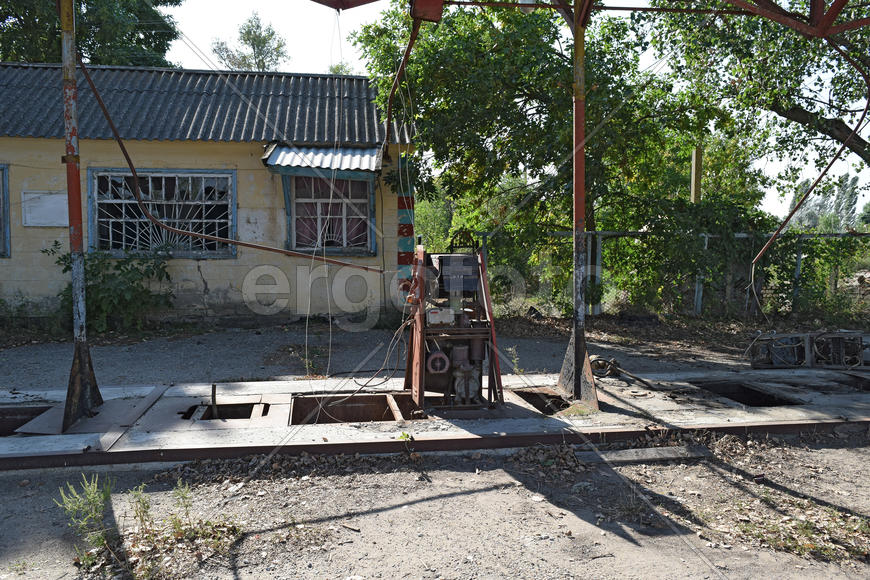 The old thrown gas station. Structure of times of socialism