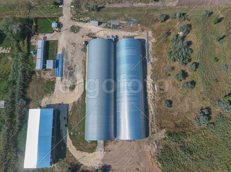 Top view of the hangars. Hangar of galvanized metal sheets for the storage of agricultural products 