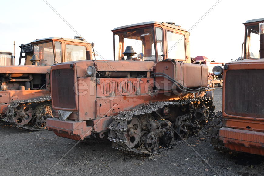 Russia, Temryuk - 15 July 2015: Tractor, standing in a row. Agricultural machinery. Parking of agric