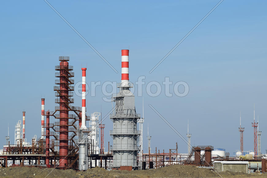 Distillation columns, pipes and other equipment furnaces refinery. The oil refinery. Equipment