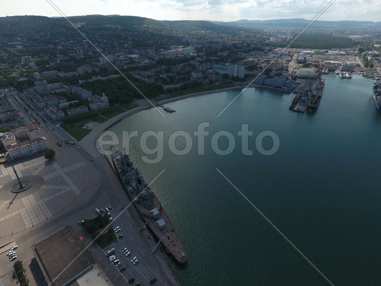 Top view of the marina and quay of Novorossiysk. Urban landscape of the port city.