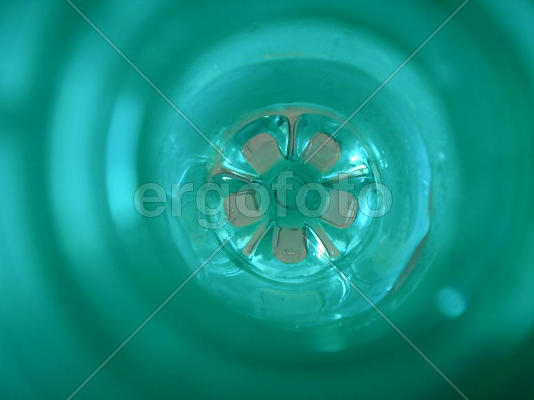 Bottom of a glass bottle on a white background