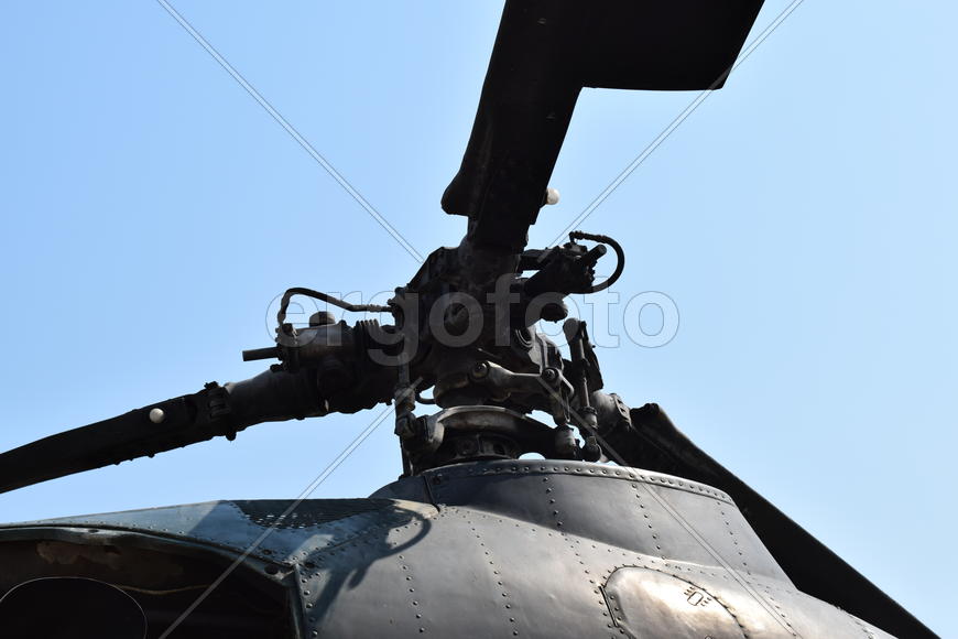 Old helicopter spraying fields. Helicopter spraying fertilizer.