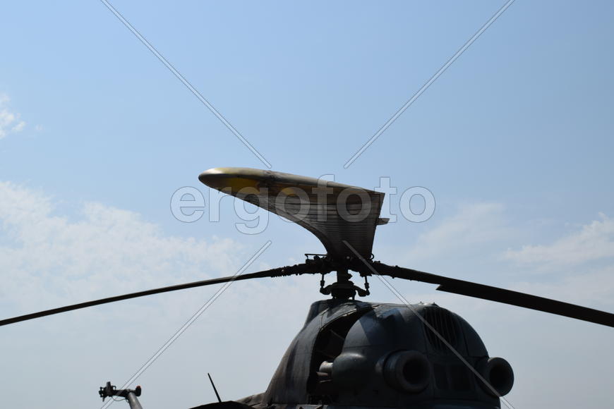 Old helicopter spraying fields. Helicopter spraying fertilizer.