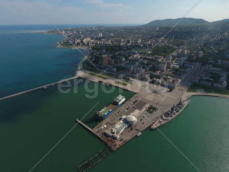 Top view of the marina and quay of Novorossiysk. Urban landscape of the port city.