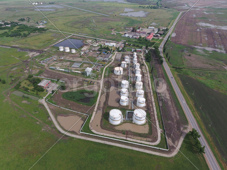 Aerial view of oil storage tanks. Industrial facility for the storage and separation of oil.