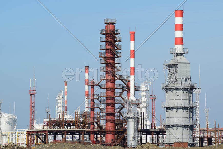 Distillation columns, pipes and other equipment furnaces refinery. The oil refinery. Equipment