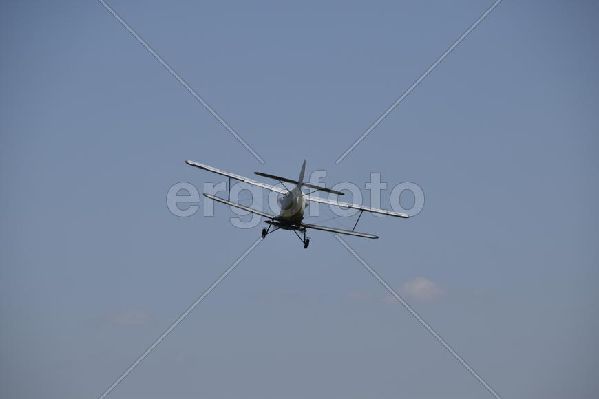 Aircraft agricultural aviation AN-2. The spraying of fertilizers and pesticides on the field with th