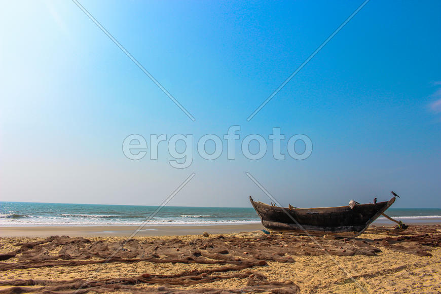 The boat on the seashore