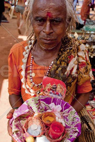 Person provides services for applying tilak