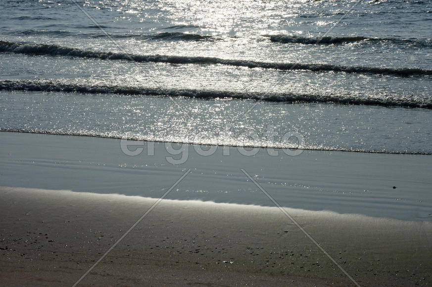 Ocean surf in the state of Goa in India in the evening