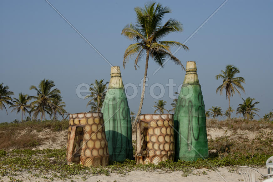 Prop bottles and mugs for advertising the restaurant on the beach in Goa, India
