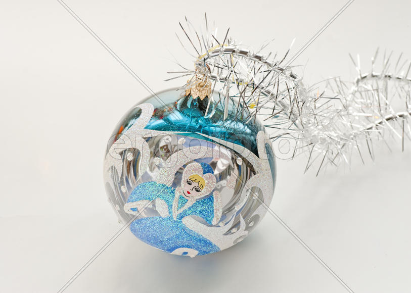Christmas toy in the shape of a ball with a picture of Snow Maiden