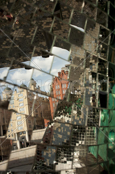 Reflection of buildings in the mirror