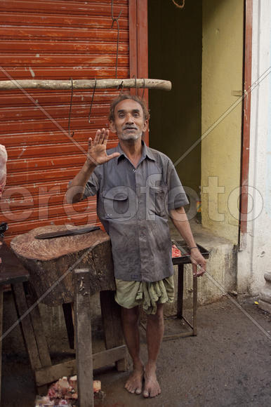 Butcher standing near his shop in Mumbai