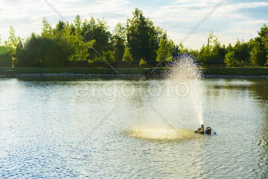 The fountain on the lake. Family fun and fishing