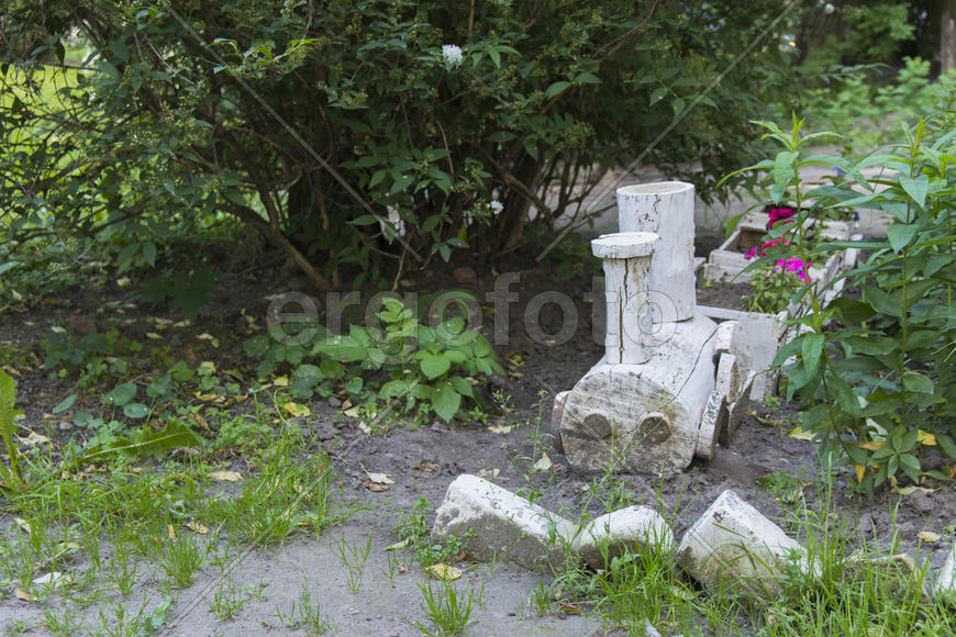 Hand crafts made of wood. Wooden train in the yard.