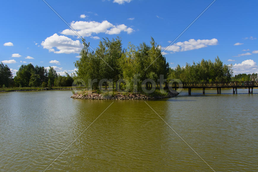 Island with a bridge on a private lake