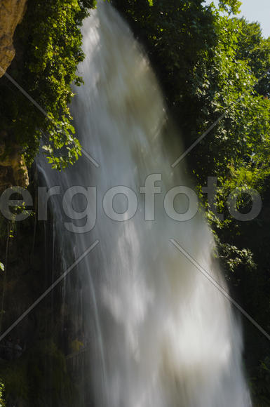 Waterfall. drop of water in the river from the ledge. The sharp drop height of the riverbed and a st