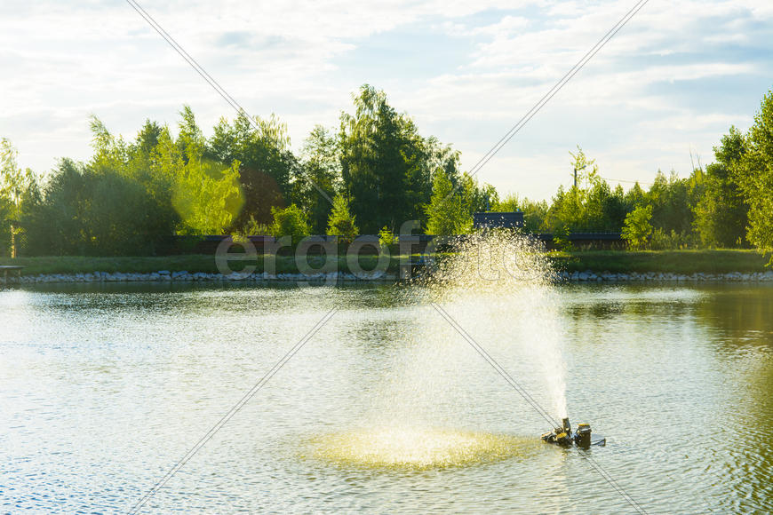 The fountain on the lake. Family fun and fishing