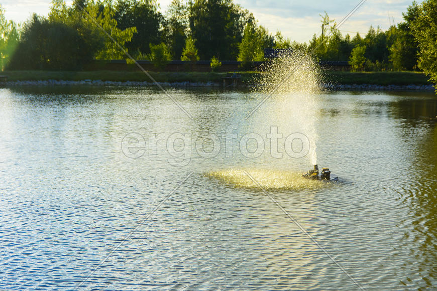 The fountain on the lake. Family fun and fishing