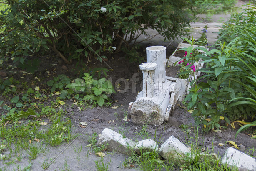 Hand crafts made of wood. Wooden train in the yard.