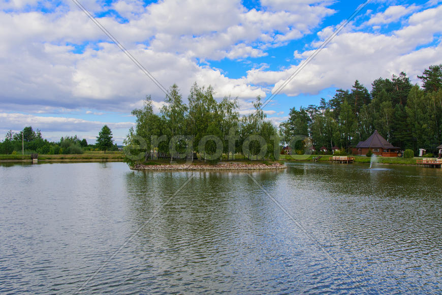 Island with a bridge on a private lake