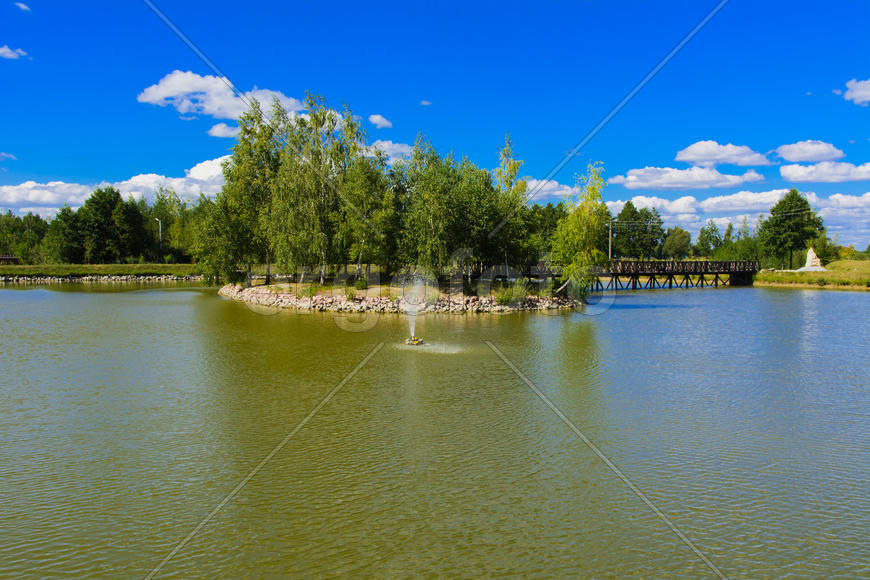 Island with a bridge on a private lake