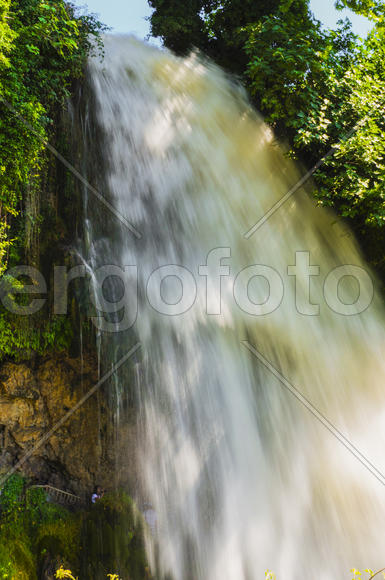 Waterfall. drop of water in the river from the ledge. The sharp drop height of the riverbed and a st