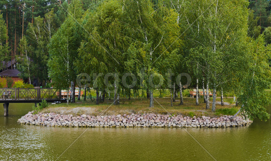 Island with a bridge on a private lake