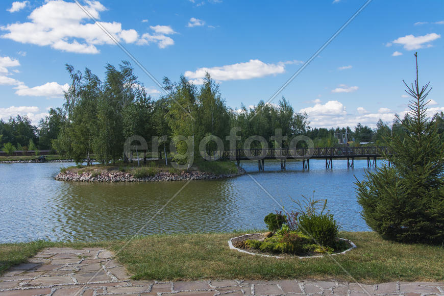 Island with a bridge on a private lake